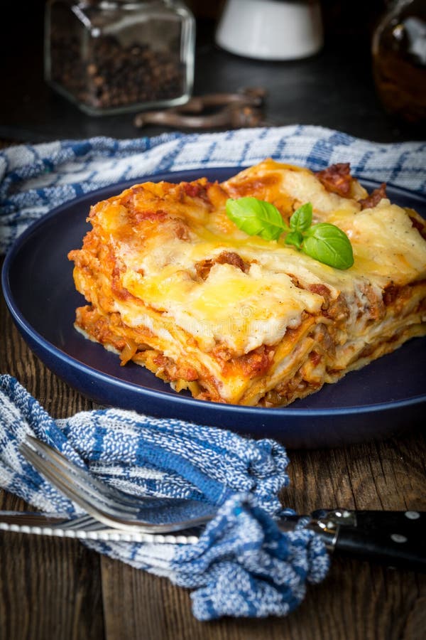 Piece of Tasty Hot Lasagna with Red Wine. Stock Image - Image of crispy ...