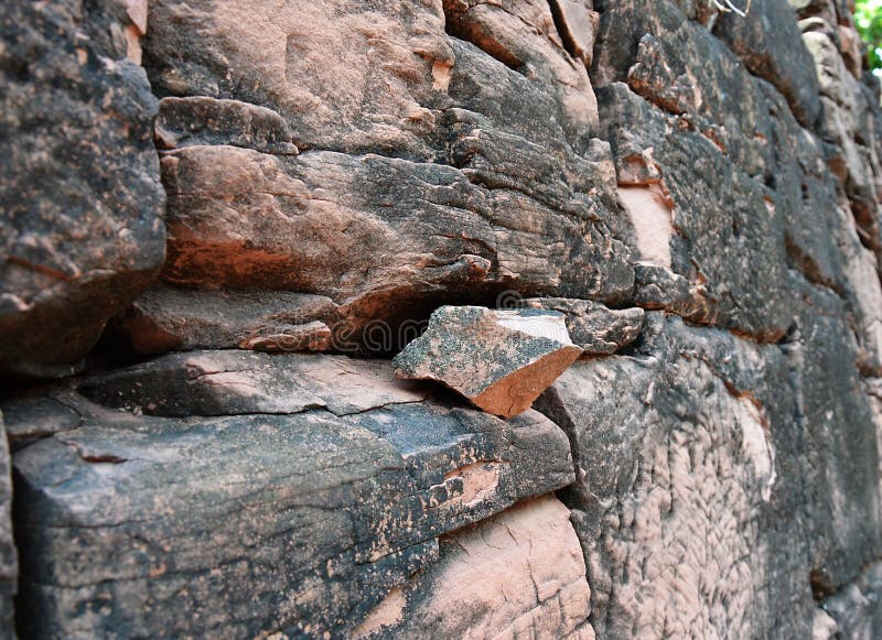 Piece of Triangle Ancient Rock on the Wall Stock Photo Image of