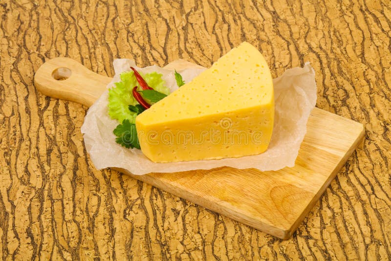 Piece. of Yellow Cheese stock photo. Image of board 179375908