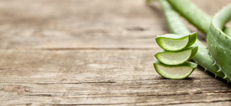 Pieces of Aloe Vera with Pulp on a Wooden Background Stock Photo - Image of  water, white: 183398158