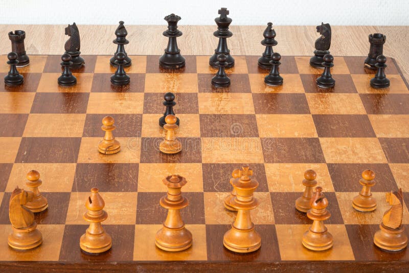 Chessboard with the Queen Gambit Opening and a Clock Showing the Time of  the Game Stock Image - Image of organized, checkered: 235866331