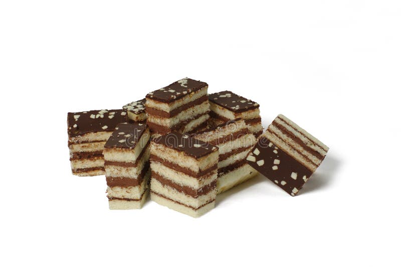 Pieces of delicious layered chocolate cake close-up royalty free stock photography