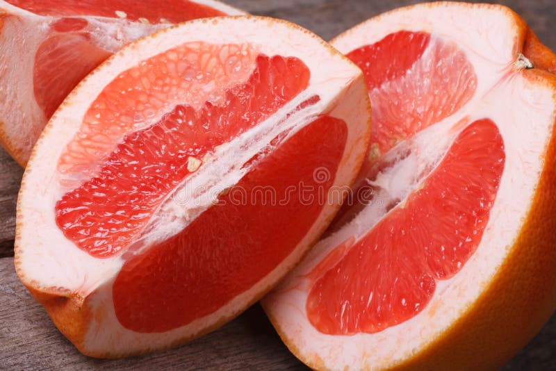 Pieces of red grapefruit closeup stock photography Pieces of red grapefruit closeup stock photography