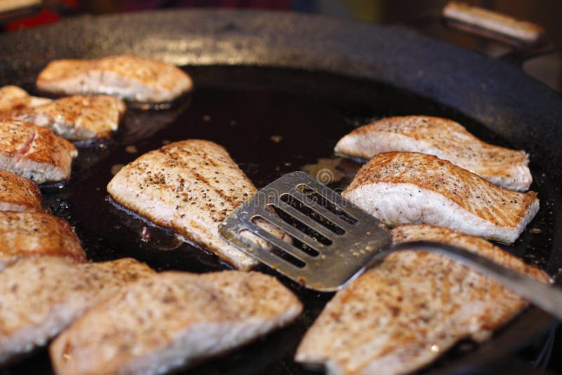 Pieces of Salmon Fry in a Large Frying Pan Stock Photo Image of