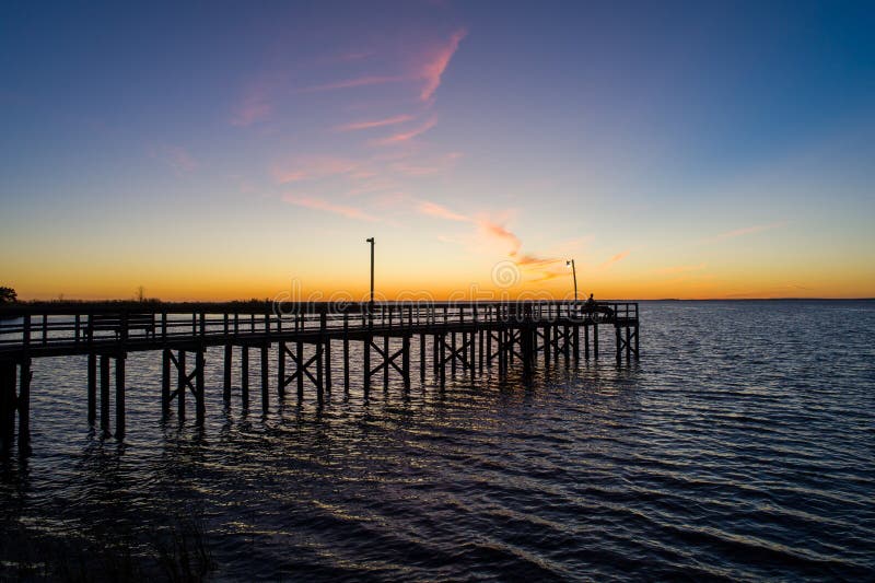 Pier on Mobile Bay from Daphne, Alabama at Twilight Stock Photo - Image ...