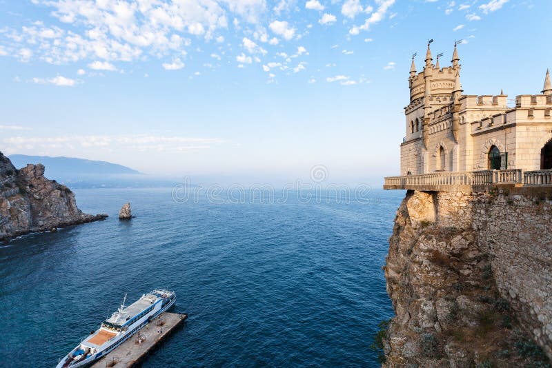 Pier and Swallow Nest castle over Black Sea stock image Pier and Swallow Nest castle over Black Sea stock image