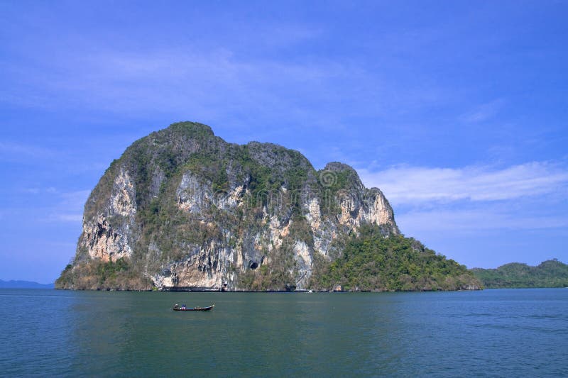 Pier to island in Thai sea.