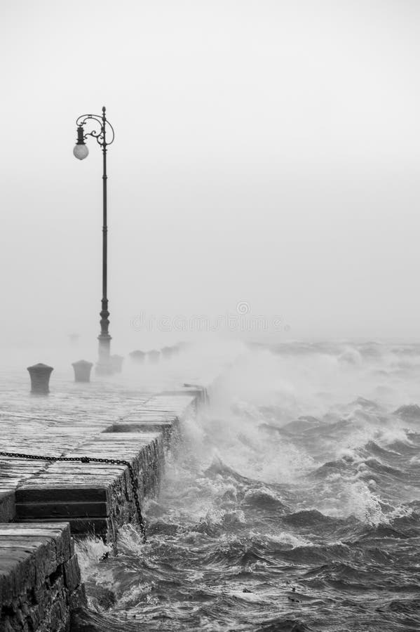 Pier with very strong wind stock photo. Image of winter - 88998616