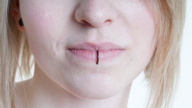Pierced Female Lips with Vertical Labret Piercing or Lip Ring Stock Image -  Image of face, blond: 110767697