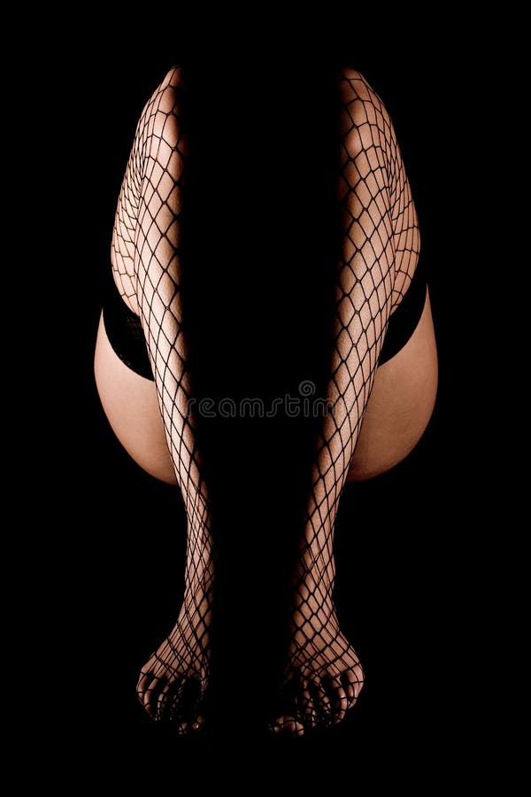 Woman legs in pantyhose on black. Woman legs in pantyhose on black