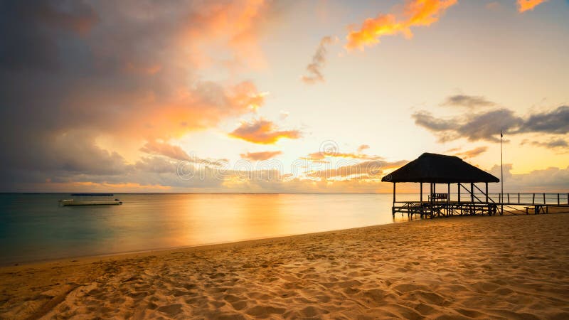 Beautiful sunset in Mauritius Island with Jetty silhouette. Beautiful sunset in Mauritius Island with Jetty silhouette