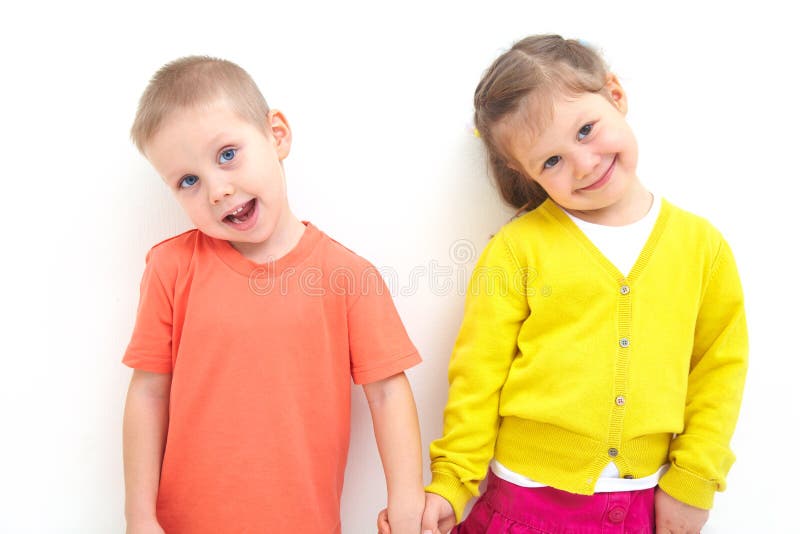 Portrait of funny little boy and a cute girl together. Portrait of funny little boy and a cute girl together