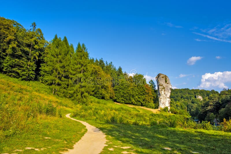 Pieskowa Skala, Poland - Monumental limestone rock Cudgel or Bludgeon of Hercules - Maczuga Herkulesa - in the Ojcowski National