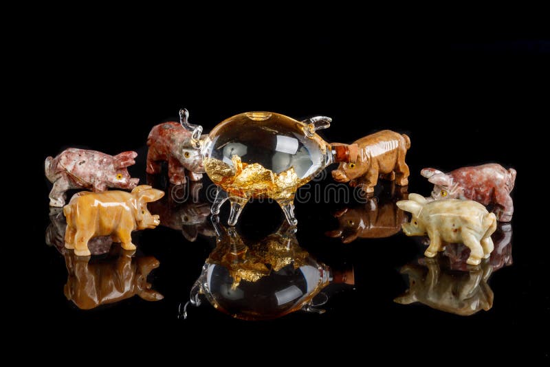 Pig Figurines Made of Onyx, Jasper, Glass, Gold on a Black Background Stock  Photo - Image of animal, astrology: 136979618
