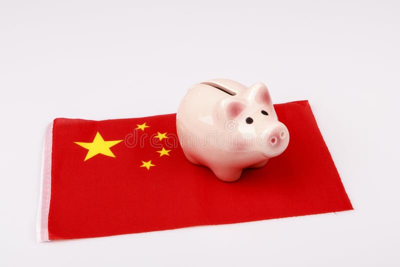 Pig money box and China flag