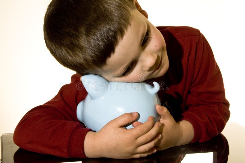 Piggy bank boy royalty free stock photos