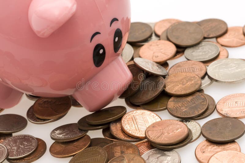 Piggy bank and scattered money
