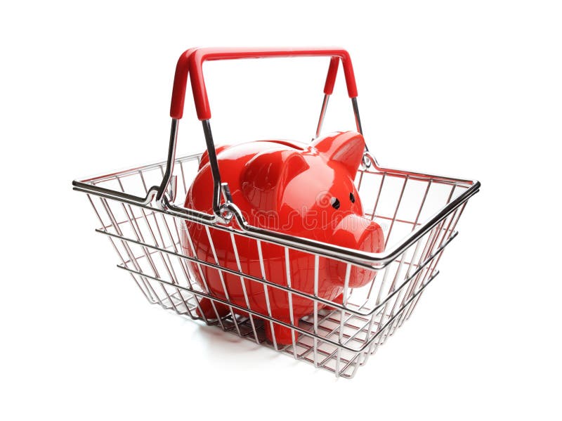 Piggy bank in shopping basket on white background