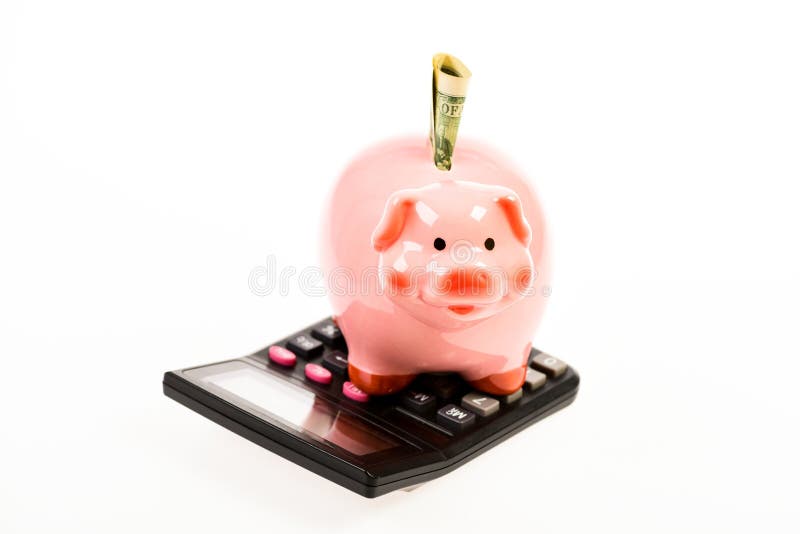 Piggy Querneigung mit Rechner moneybox Berechnung des Jahreseinkommens Stecken eines Geldes in eine piggy Querneigung Erstes Geha stockfotos Piggy Querneigung mit Rechner moneybox Berechnung des Jahreseinkommens Stecken eines Geldes in eine piggy Querneigung Erstes Geha stockfotos