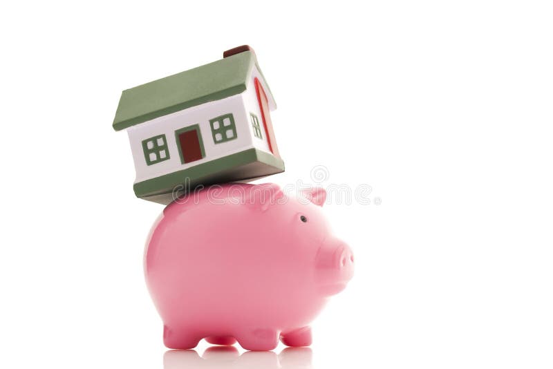 Piggy Querneigung und Haus stockfoto Piggy Querneigung und Haus stockfoto