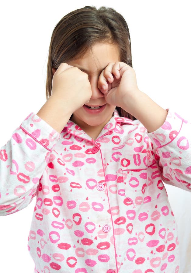 Pijamas desgastando da menina sonolento isolados no branco fotografia de stock royalty free Pijamas desgastando da menina sonolento isolados no branco fotografia de stock royalty free