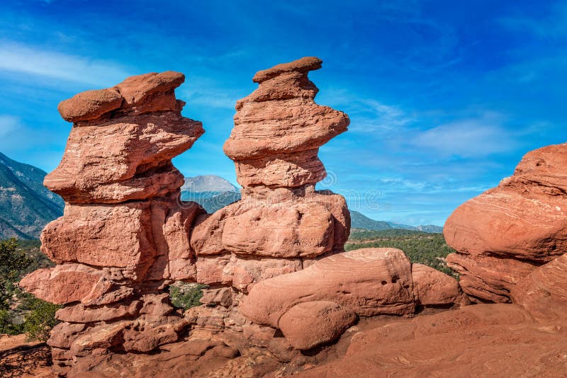 Pikes peak behind the Siamese Twins Rock in the Garden of the Gods