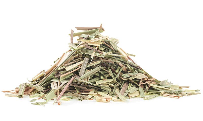 Pila de hierba limonada para el té aislada en fondo blanco. cimbopogón seco imagenes de archivo