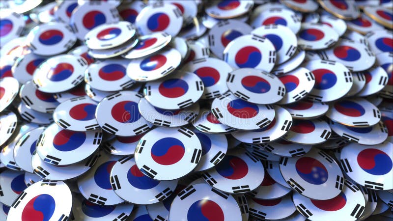 Pila de insignias que ofrecen banderas de la Corea del Sur