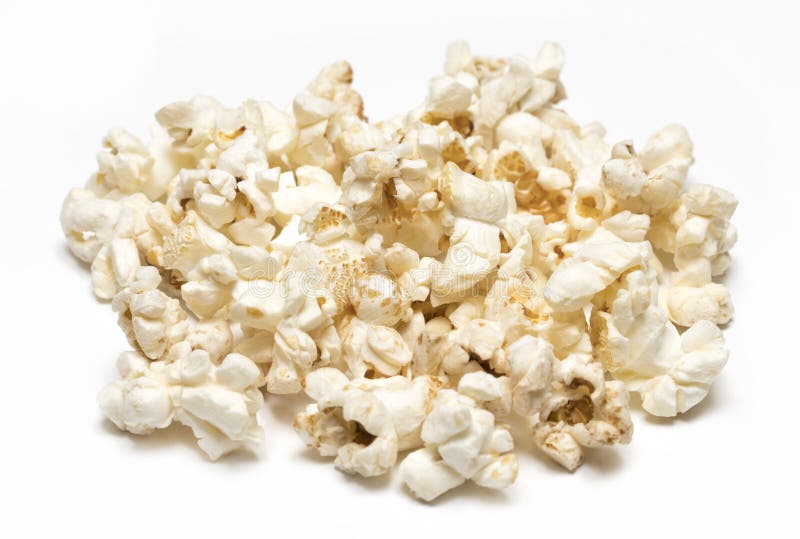 Pila de palomitas aislada en el fondo blanco fotografía de archivo Pila de palomitas aislada en el fondo blanco fotografía de archivo
