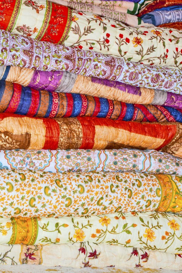 Handloom quilts stack from an Indian Shop. Handloom quilts stack from an Indian Shop