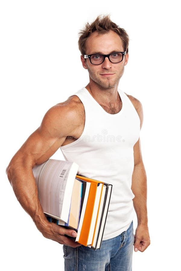 Pila que lleva del hombre caucásico de libros imagen de archivo libre de regalías Pila que lleva del hombre caucásico de libros imagen de archivo libre de regalías
