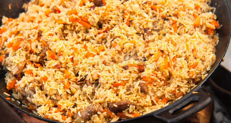 Pilaf (Plov) - Afghan, Ouzbékistan, plat principal de cuisine nationale tadjik photographie stock Pilaf (Plov) - Afghan, Ouzbékistan, plat principal de cuisine nationale tadjik photographie stock