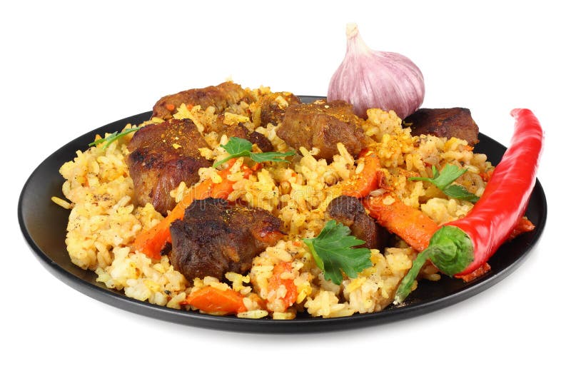 pilaf с перцем мяса и chili на черной плите изолированной на белой предпосылке стоковые фото pilaf с перцем мяса и chili на черной плите изолированной на белой предпосылке стоковые фото