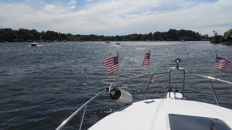 Bow of boat on fourth of july with flags. Bow of boat on fourth of july with flags