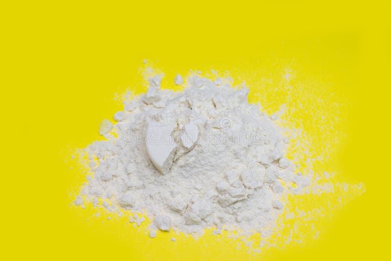 Pile of Banana Protein Powder Isolated on Yellow Background Stock Photo