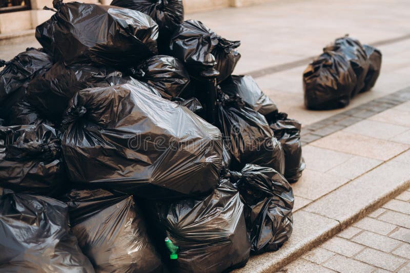 Green and Black Garbage Bags Stock Photo - Image of liner, household:  80226858