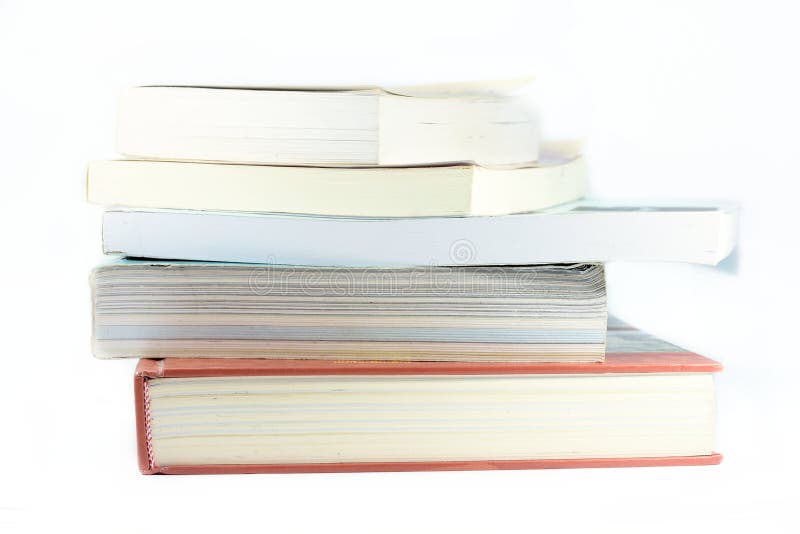 The pile of books over the stacking with many other books royalty free stock image