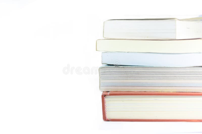 The pile of books over the stacking with many other books stock photography