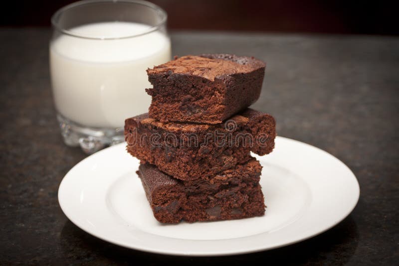 Pile of Brownies and Milk stock photo. Image of double 24701794