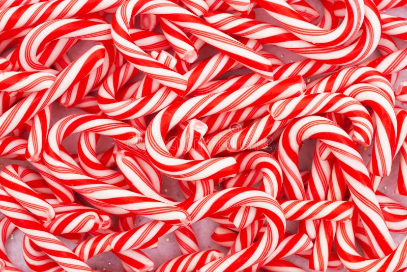 Pile of candy canes Christmas background for your holiday message