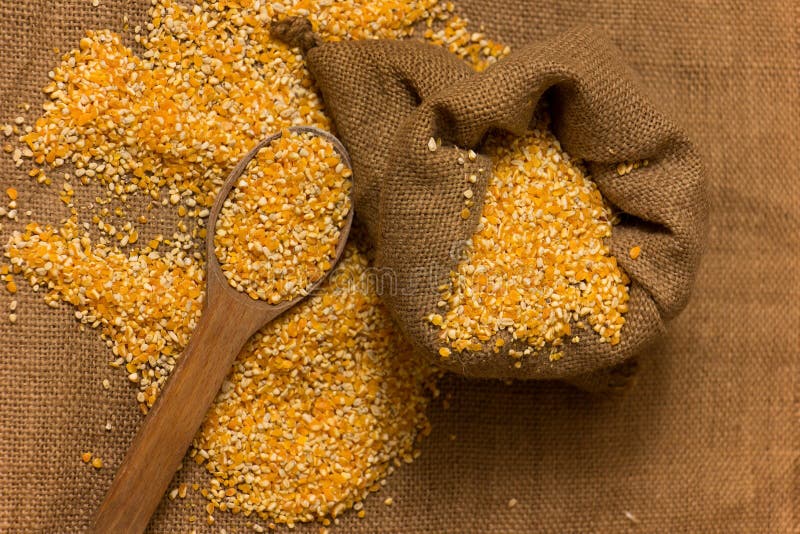 Pile of Corn Grits stock photo. Image of ingredient, dieting 55827824