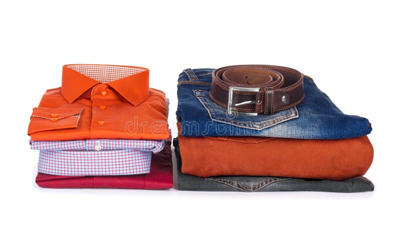Pile de chemises, de chandails et de jeans colorés photo stock Pile de chemises, de chandails et de jeans colorés photo stock