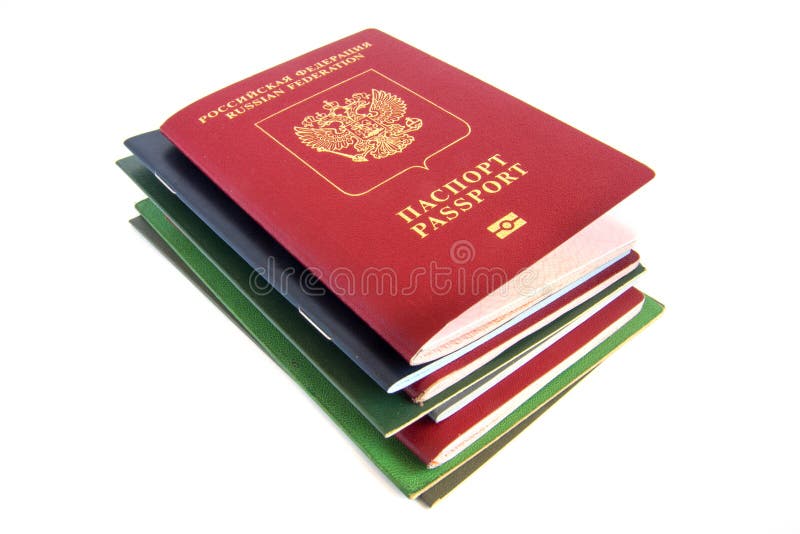 Stack of different documents with russian passport on top isolated on white background. Difficult bureaucracy concept. Stack of different documents with russian passport on top isolated on white background. Difficult bureaucracy concept.