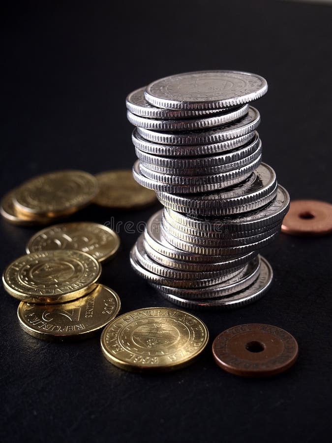 Photo of a stack of Philippine peso coins. Photo of a stack of Philippine peso coins