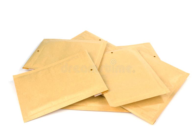 Pile different size bubble lined shipping or packing envelopes royalty free stock photos