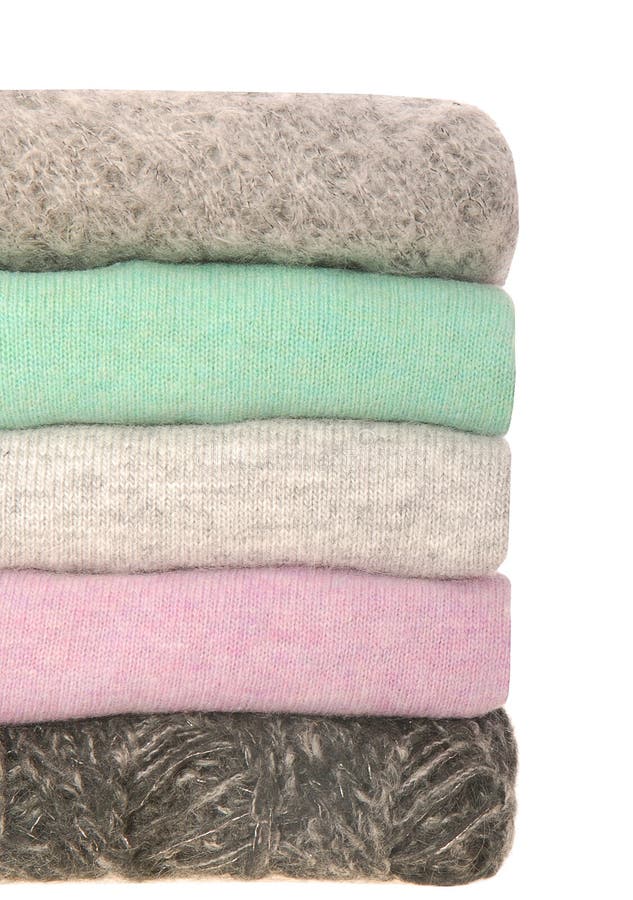 Sweaters pile. stock photo. Image of casual, garments - 84560862