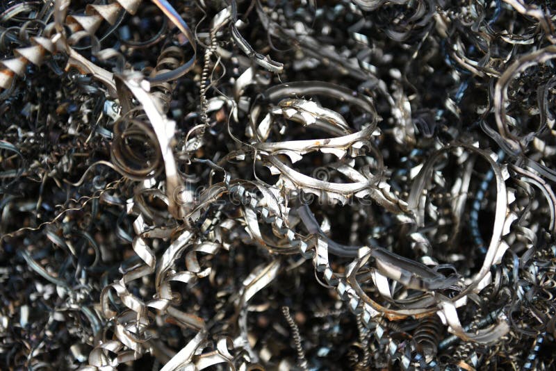 Pile of discarded raw industrial scrap metal spiral shavings and filings. royalty free stock photo Pile of discarded raw industrial scrap metal spiral shavings and filings. royalty free stock photo