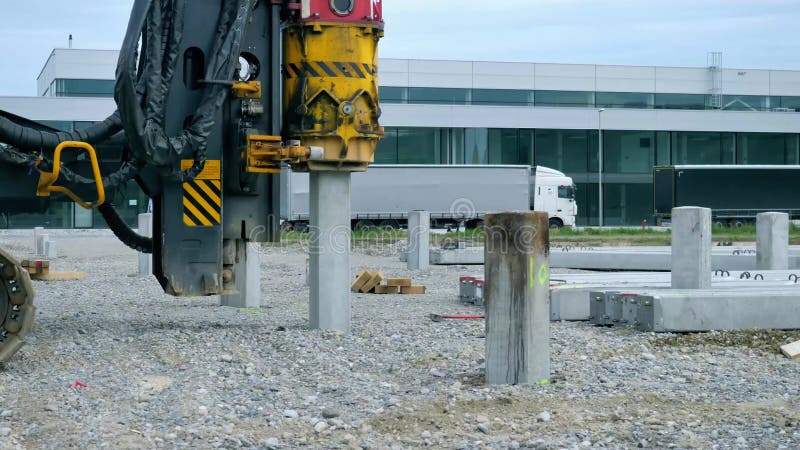 Pile driver machine scores piles. Driver banging stock images, royalty-free photos and pictures