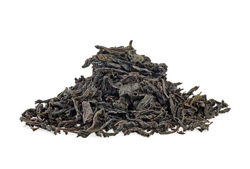 Pile of Dry Black Tea Leaves Isolated on White Background Stock Image