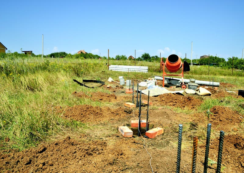 Pile Foundations Support the Floor. Closeup of the Mount Base Floor of a Frame House Stock Photo